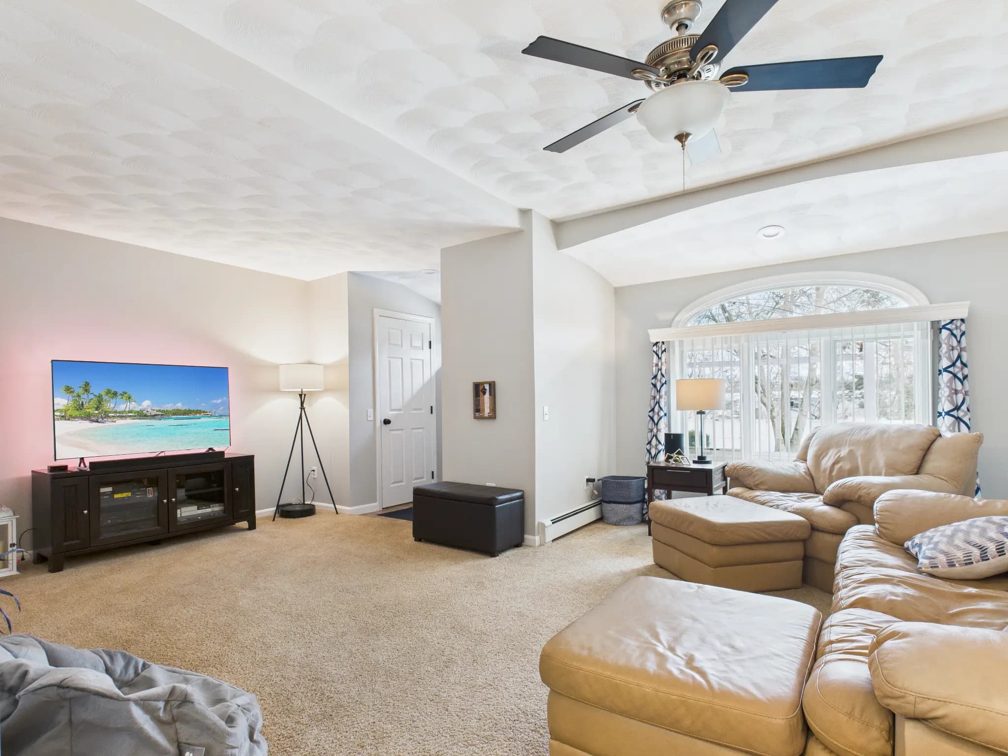 Lower-level living room real estate photography sample
