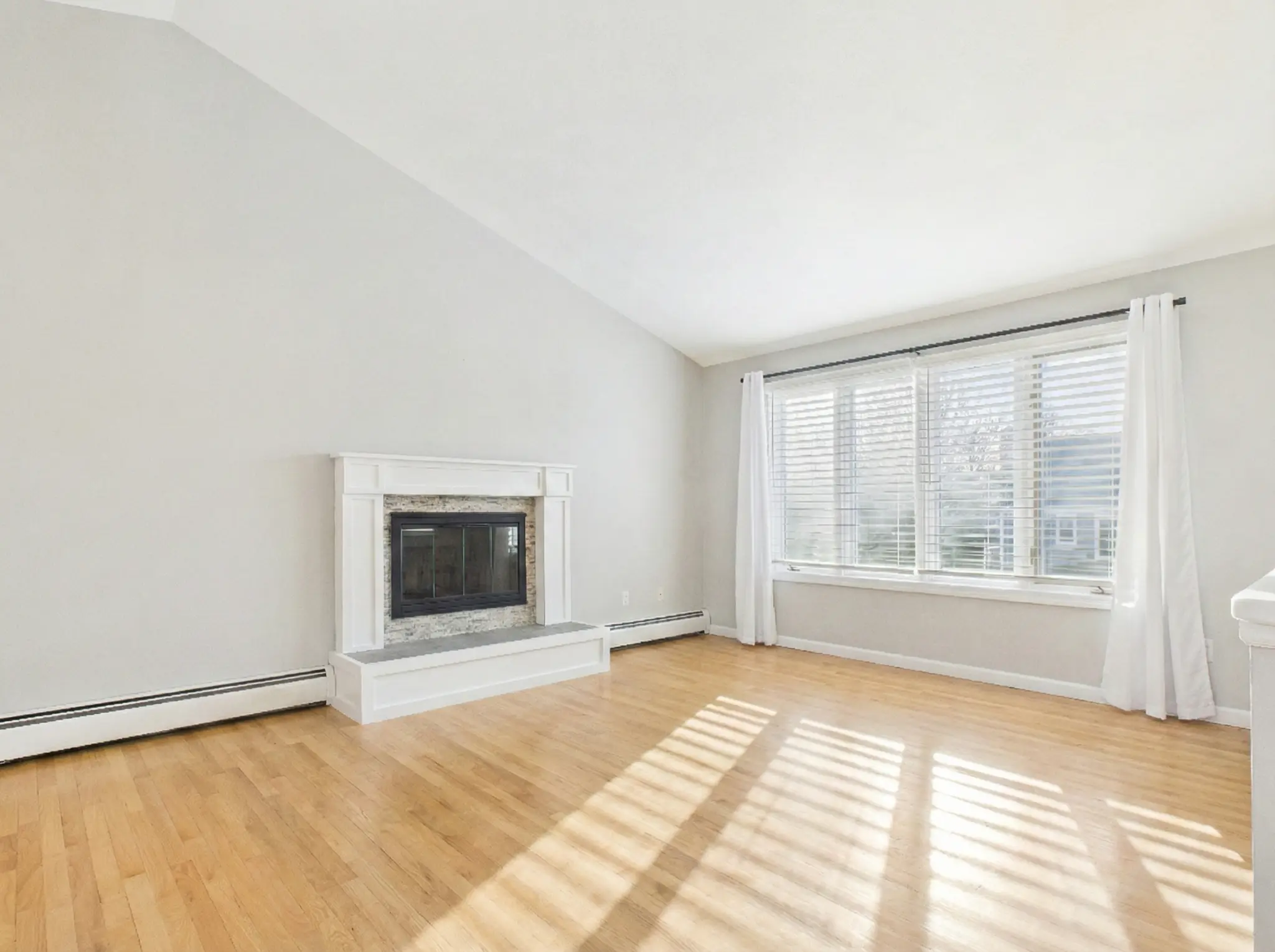 Living room virtually emptied to show clean, open space